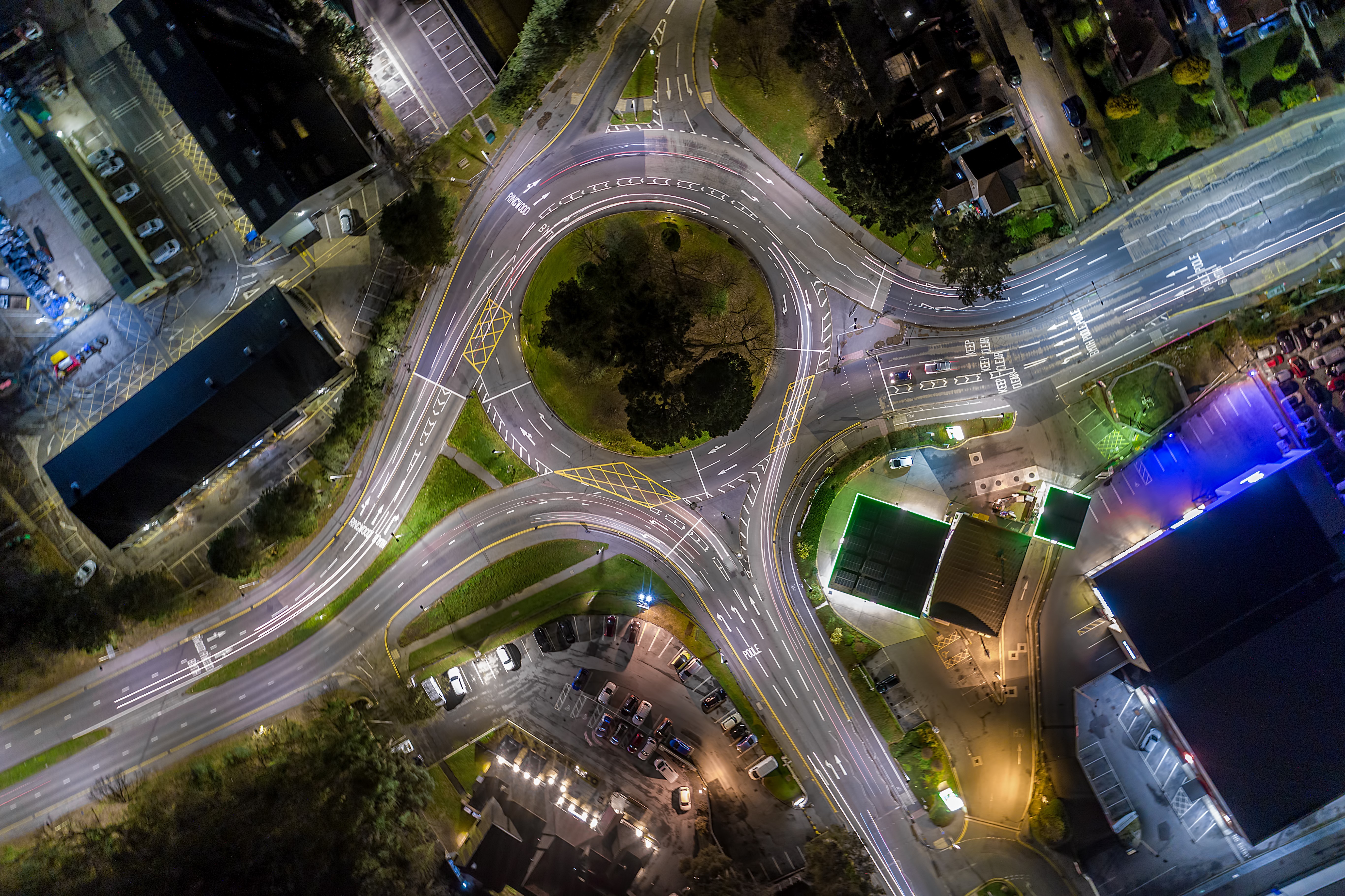 a picture of a roundabout at night taken by drone